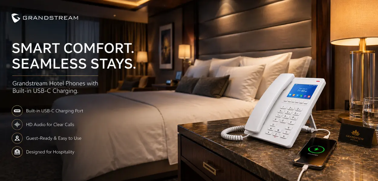 Grandstream GHP630 color-screen hotel phone on a bedside table in a serviced apartment room